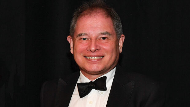 Dr Phil Wadey, pictured in black tie at the 2022 Horse & Hound Awards, is among the members of the equestrian world to be named in the New Year Honours List.