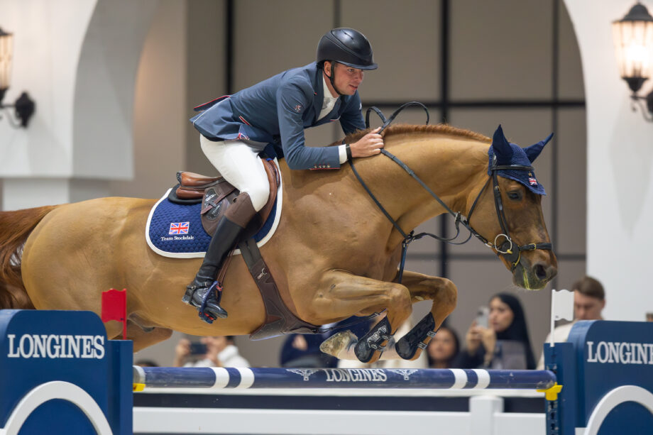 Joe Stockdale and Ebanking win the CSI5* grand prix in Abu Dhabi, UAE - the first top tier grand prix success of Joe's career.