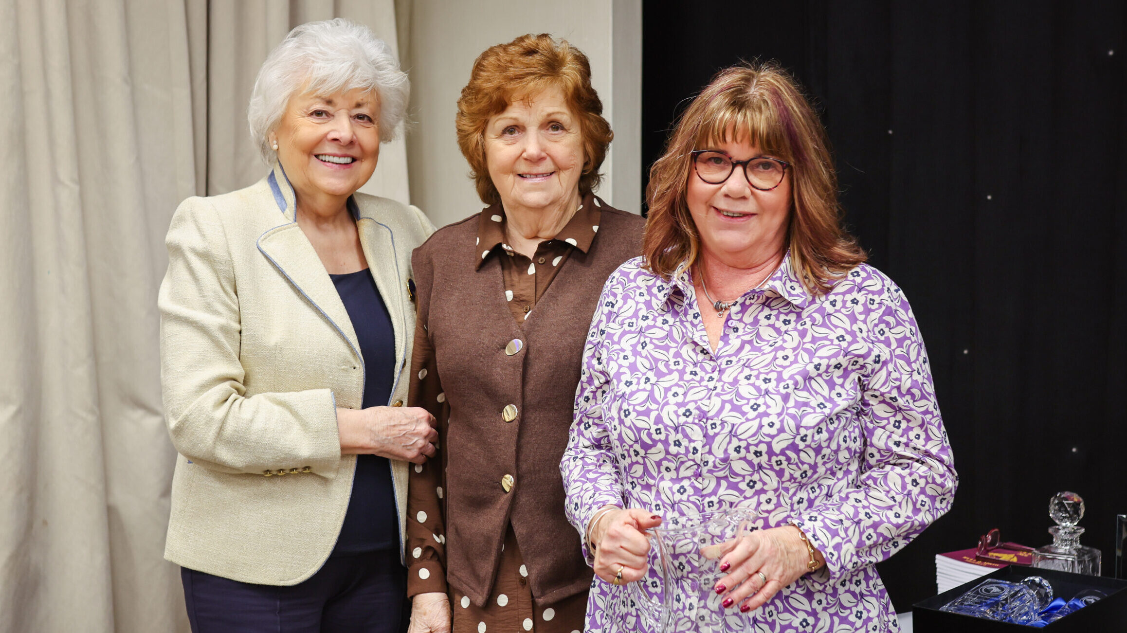 2026 BSPS award winner Sharon Tesloff Smith is presented the BSPS Long Service award by Joy Hall and Pat Pattinson.