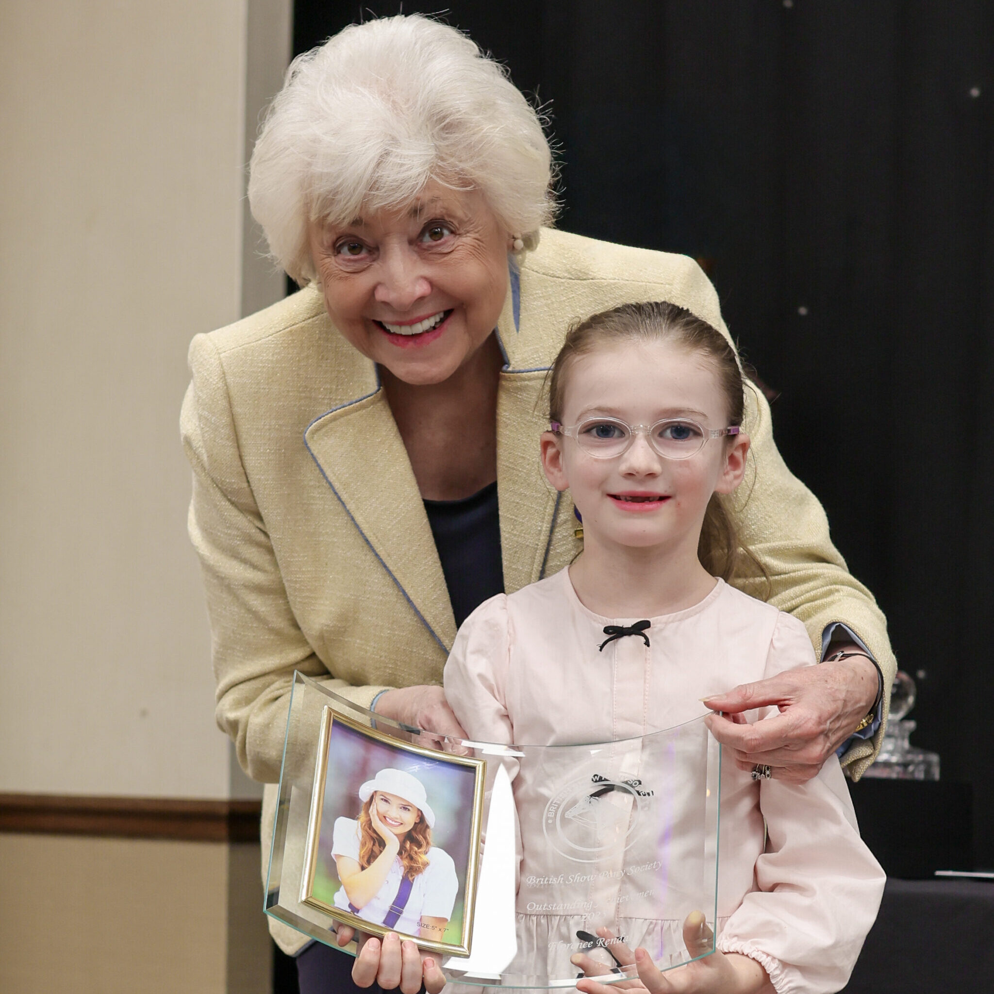 2026 BSPS award winner Florence Rendall is presented her award by Pat Pattinson