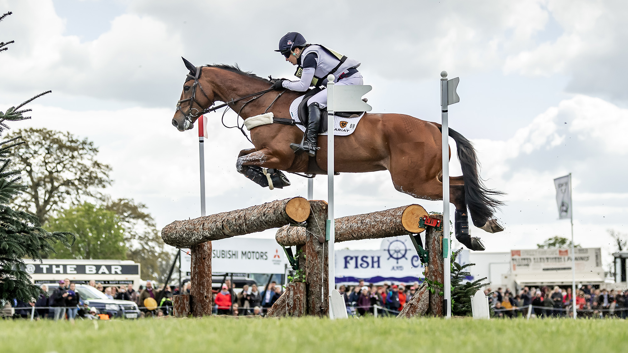 Mr Bass, who has died aged 18, and Laura Collett jumping a cross-country fence at Badminton 2019.