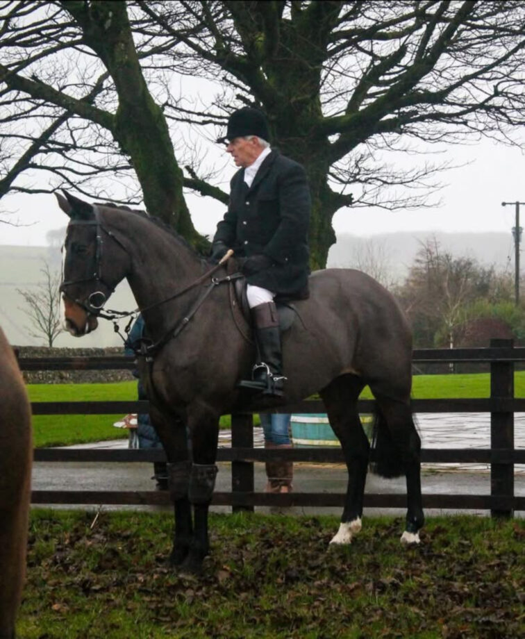 Pictured huntsman Edward Hammond on a horse.