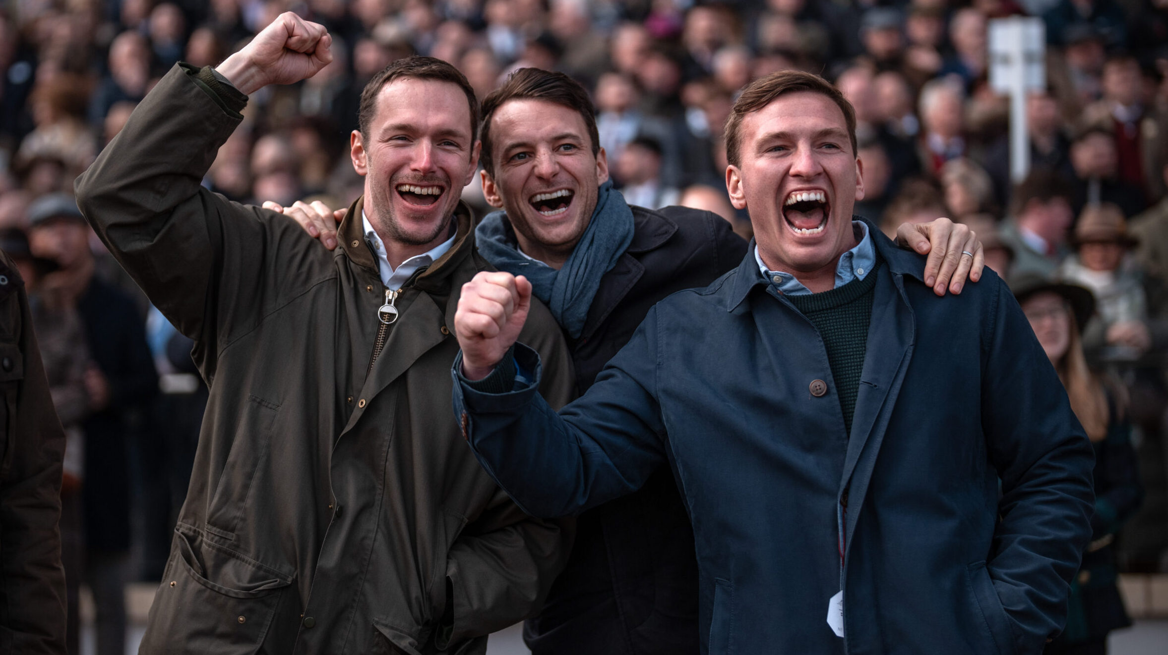 Men dressed in warm clothing for National Hunt racing