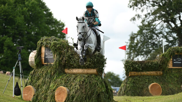 Panda Christie and Sir Villmer jump one of the new fences on the Bramham Horse Trials cross-country course in 2025.