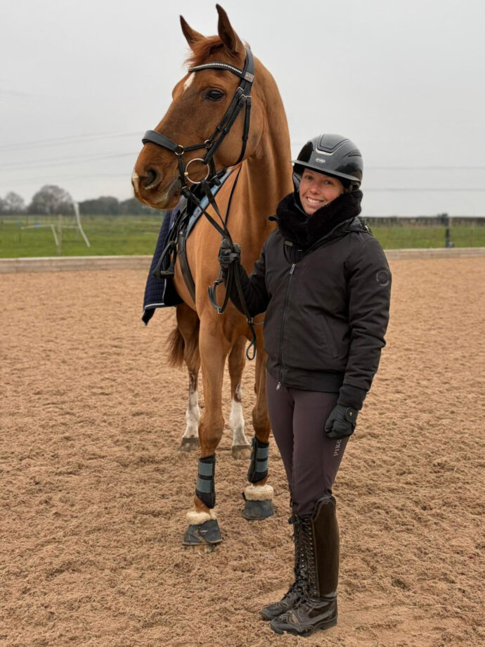 British Paralympic medallist Sophie Wells standing alongside her new horse, MSJ Gold Standard, who she will be aiming at the World Championships this summer.