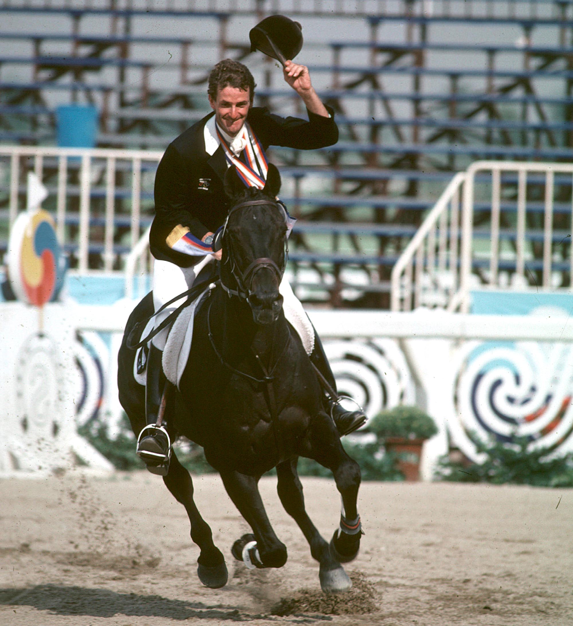 Mark celebrates gold with a lap of honour at the 1988 Seoul Olympics
