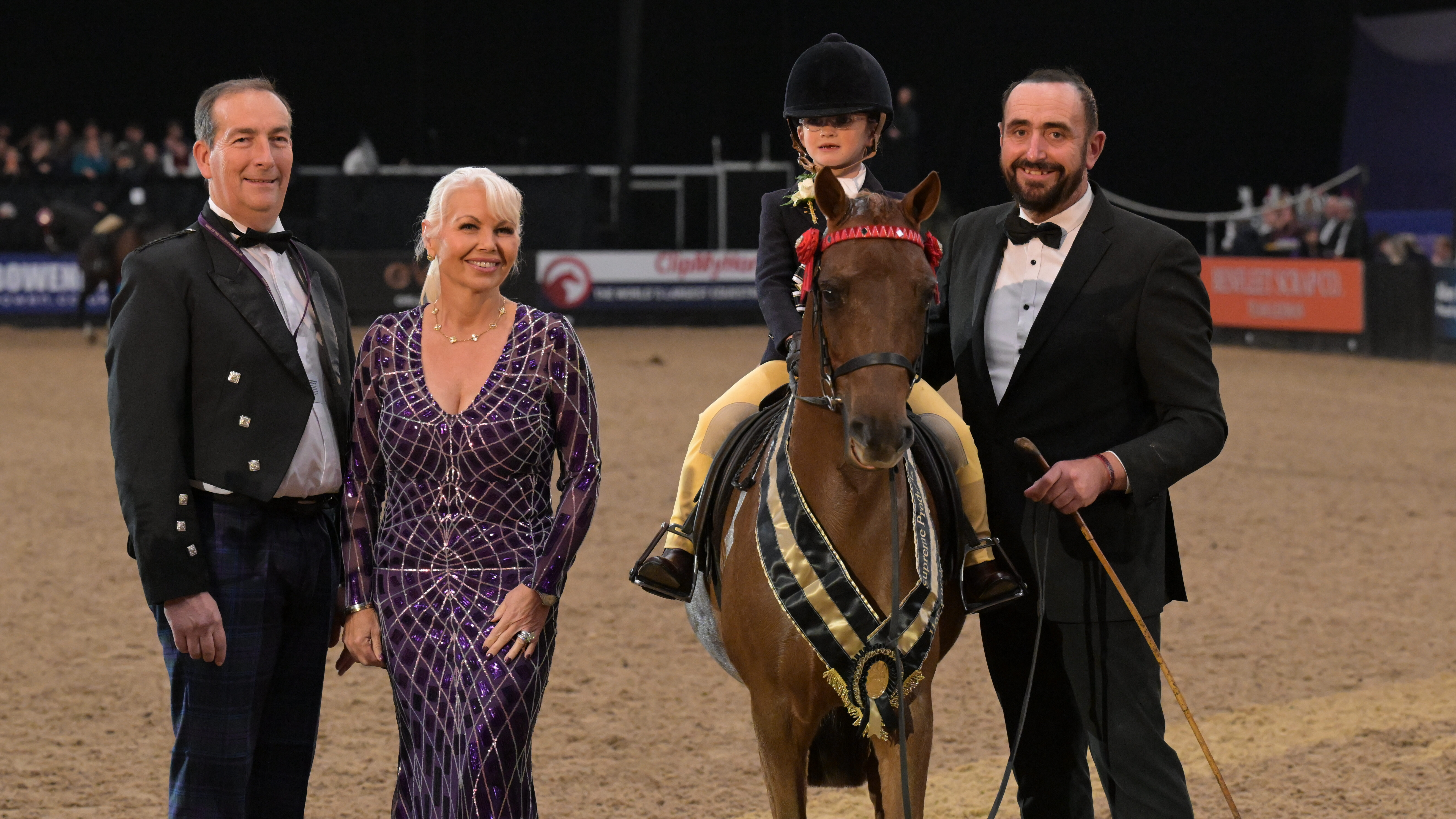 Florence Rendall astride Elmswood Spring Parade, led by John Harvey