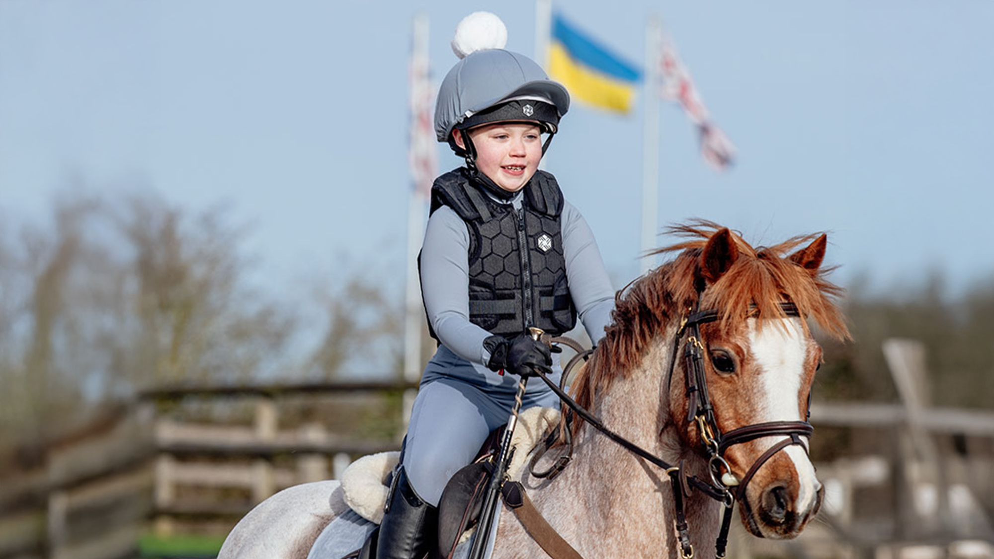 Child wearing hexa body protector by Charles Owen 