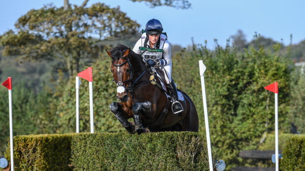 Pictured British eventer Bubby Upton and her horse Cannavaro jumping a cross-country fence at Burnham Market in 2020.