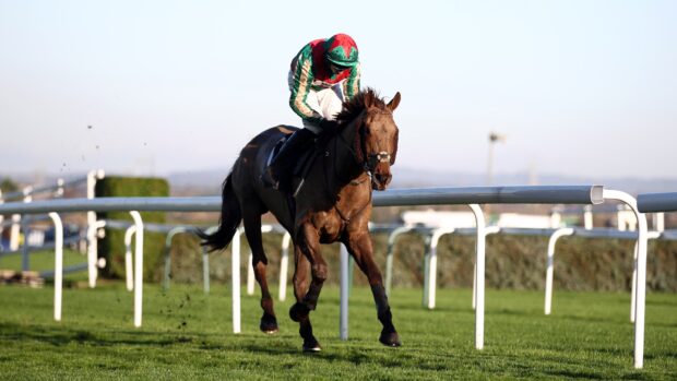 Image shows chestnut racehorse Vieux Lion Rouge ridden by Conor O'Farrell galloping to win the William Hill Becher Handicap Chase at Aintree Racecourse on December 5, 2020 in Liverpool, England. (Photo by Tim Goode - Pool/Getty Images)