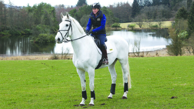Louisa Milne Home riding King Elder at home