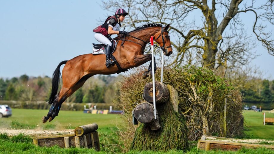Image shows Sarah Bullimore and Reve Du Rouet jumping a cross-country fence at Aston-le-Walls in 2021.