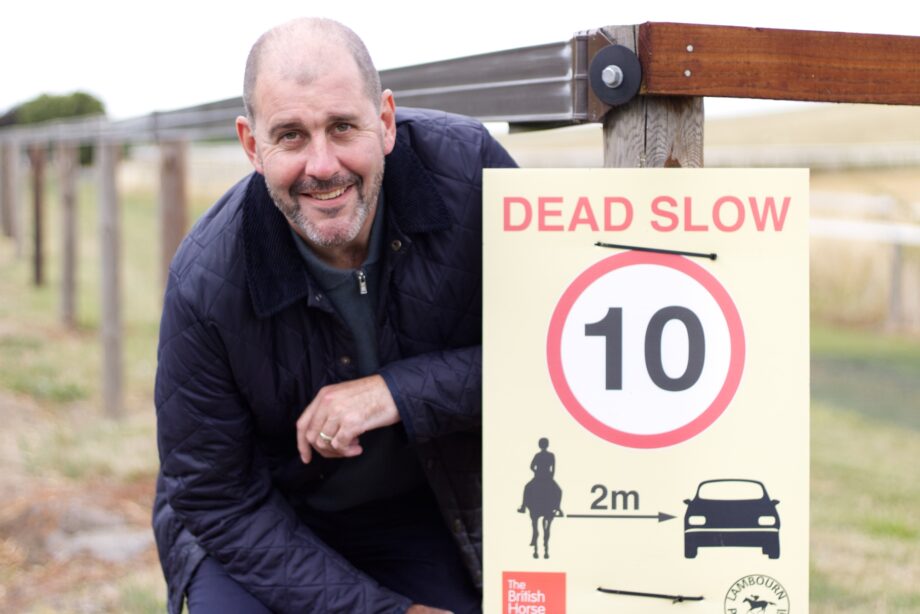 Lee Dillon MP with a Dead Slow equestrian road safety poster