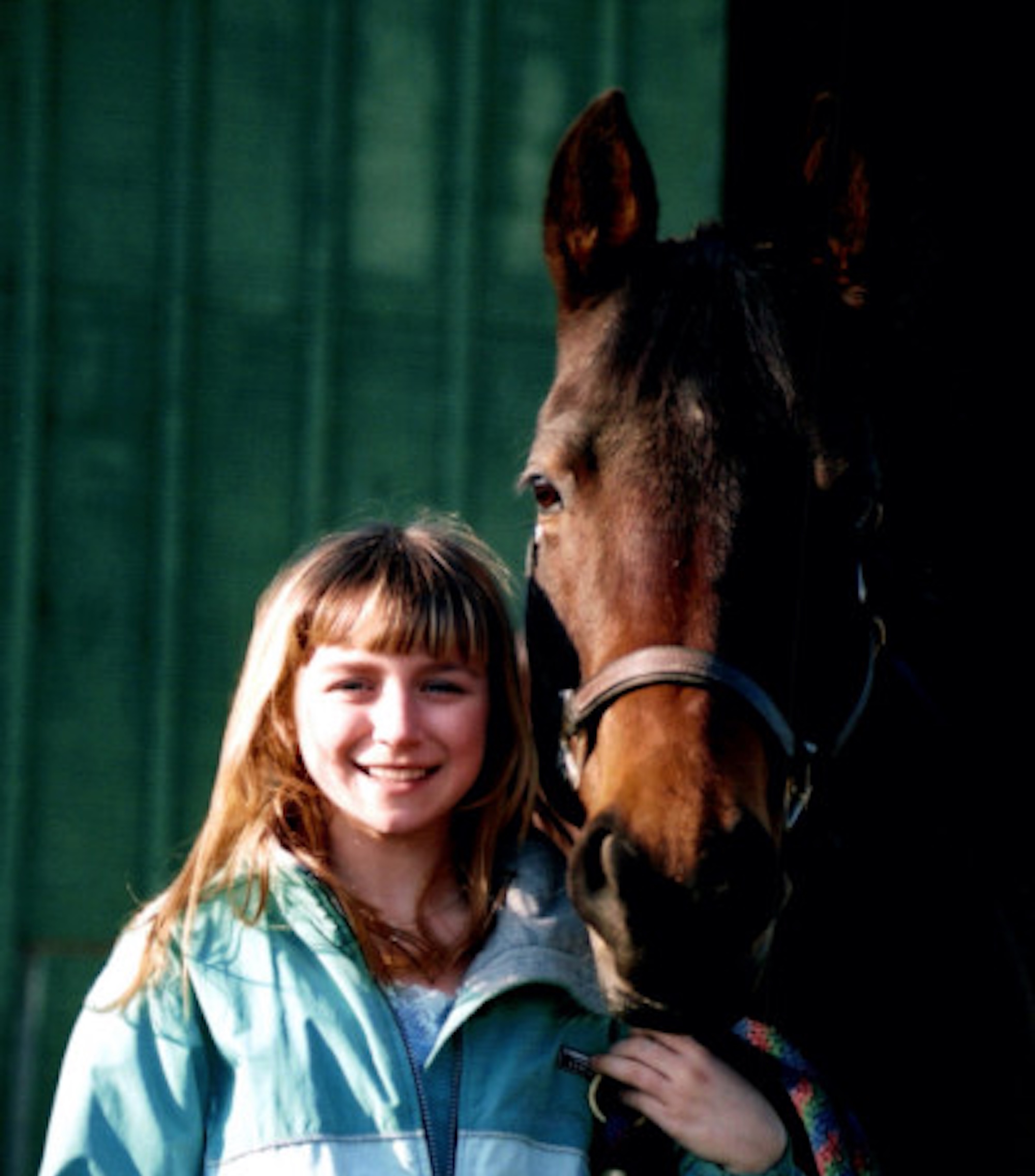 Paige as a child holding Fancy