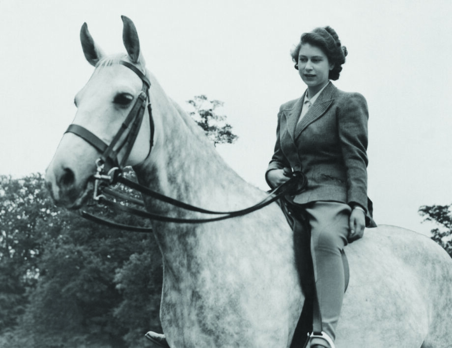 8th July 1946: Princess Elizabeth riding in the grounds of the Royal Lodge, Windsor. She is riding out on her 20th birthday.