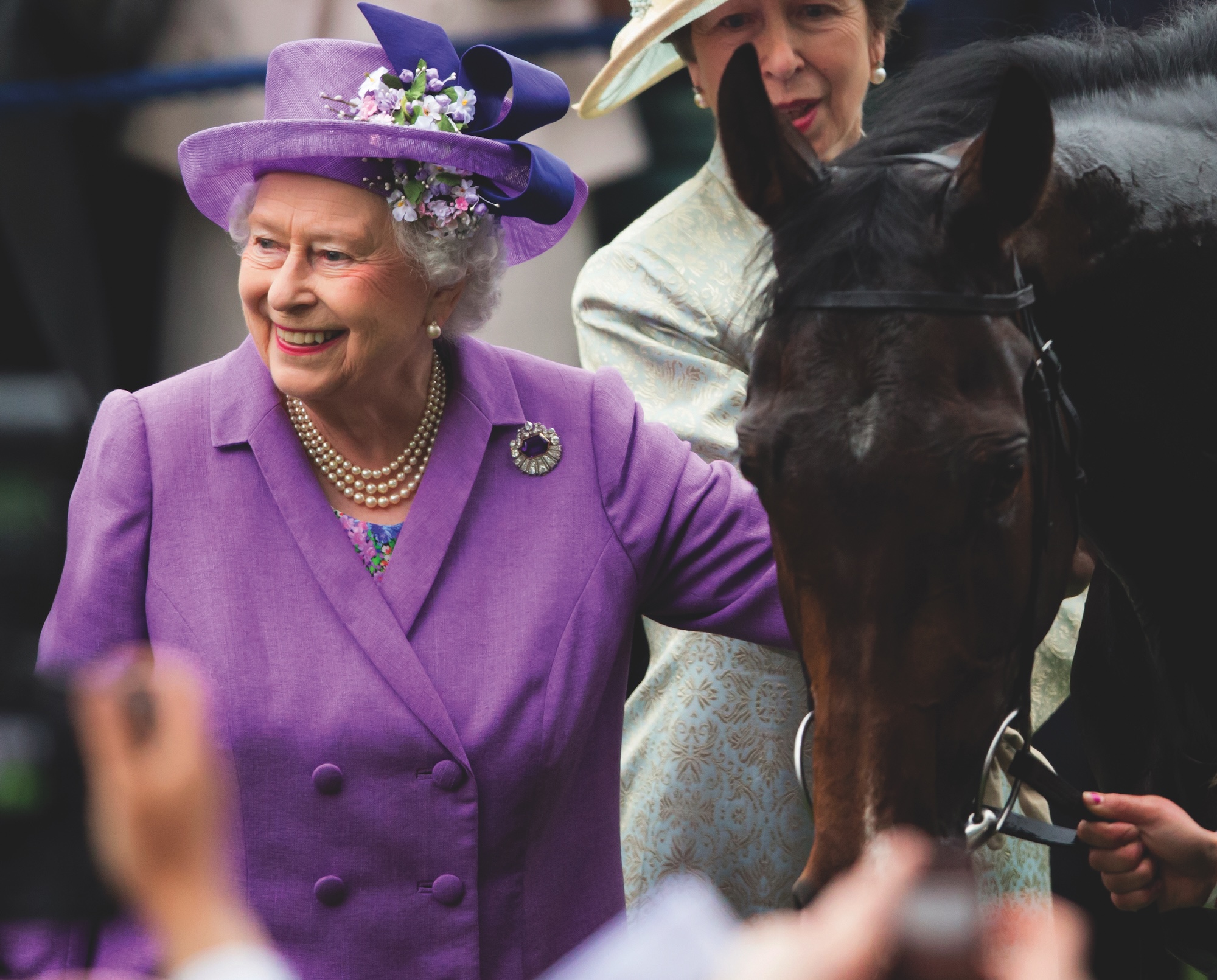 The Queen with Estimate in 2013 after her horse won the Ascot Gold Cup