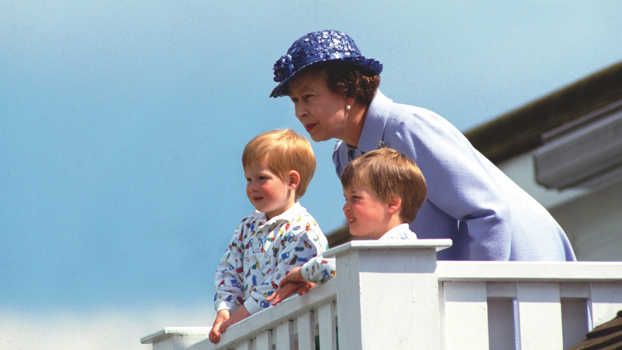 The Queen with Harry and William as young princes watching their father the Prince of Wales play polo