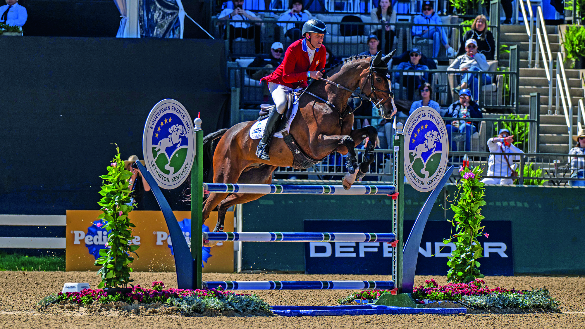 Boyd Martin and Commando 3 clear a showjump en route to second at Kentucky 2025.