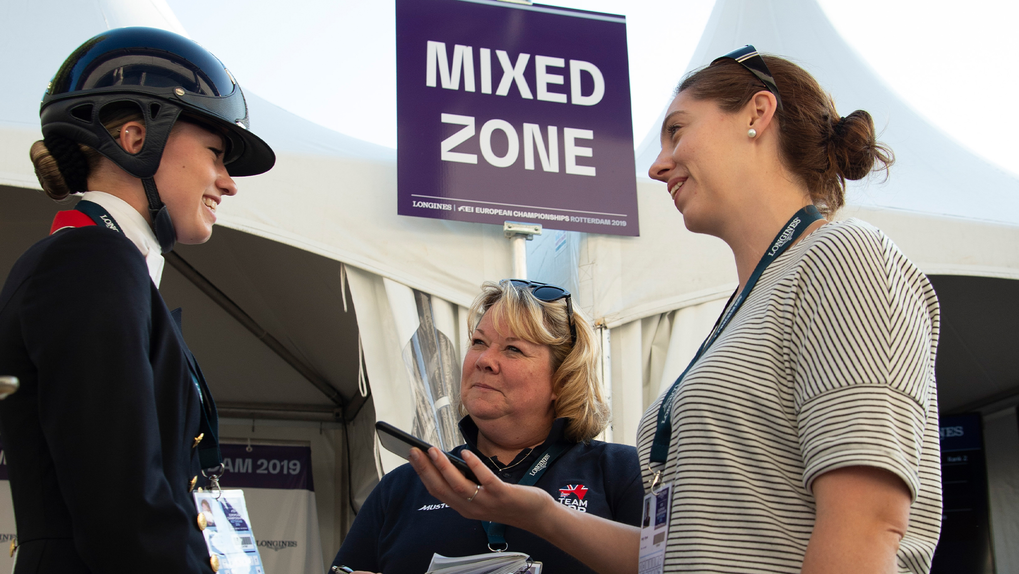 H&H reporter Polly Bryan interviewing Lottie Fry in the mixed zone at the European Championships