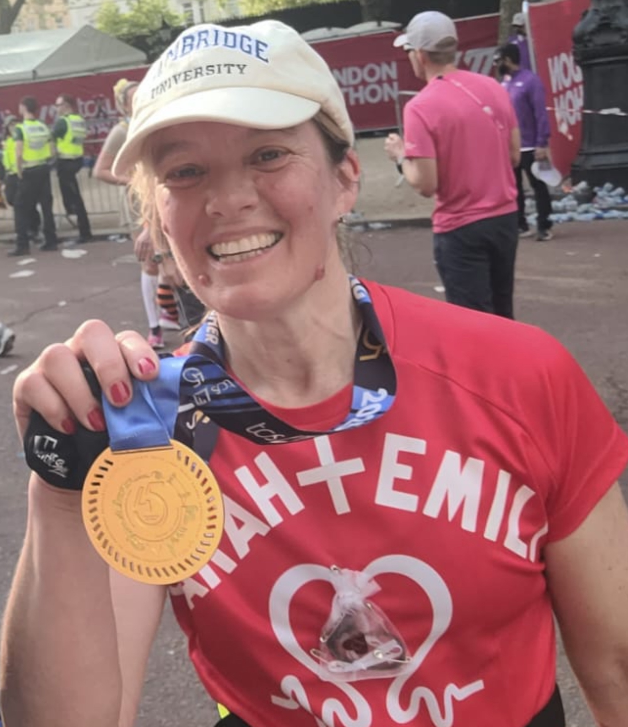 Sarah, pictured after running last year’s London Marathon. She always runs with a lock of her daughter’s hair over hear heart. 