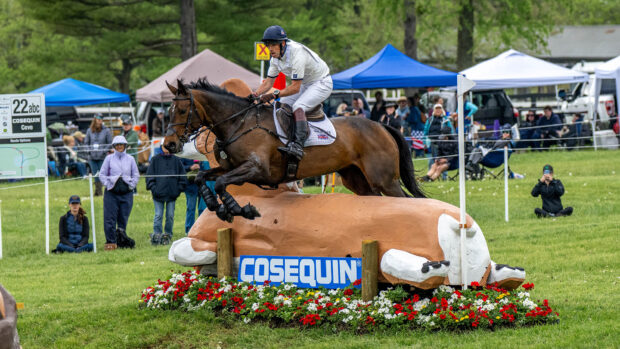 Harry Meade and Grafennacht jump a cross-country fence at Kentucky Three-Day Event 2025.