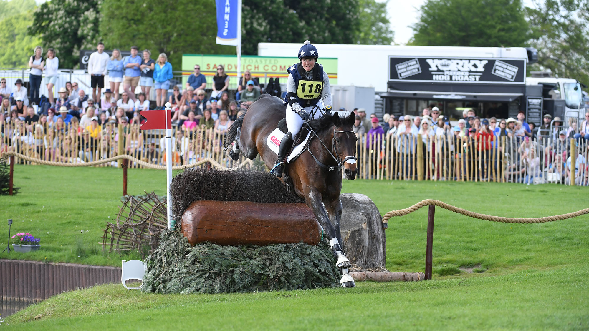 Kylie Rodd and SRS Kan Do jump a cross-country fence at Badminton Horse Trials 2022. 