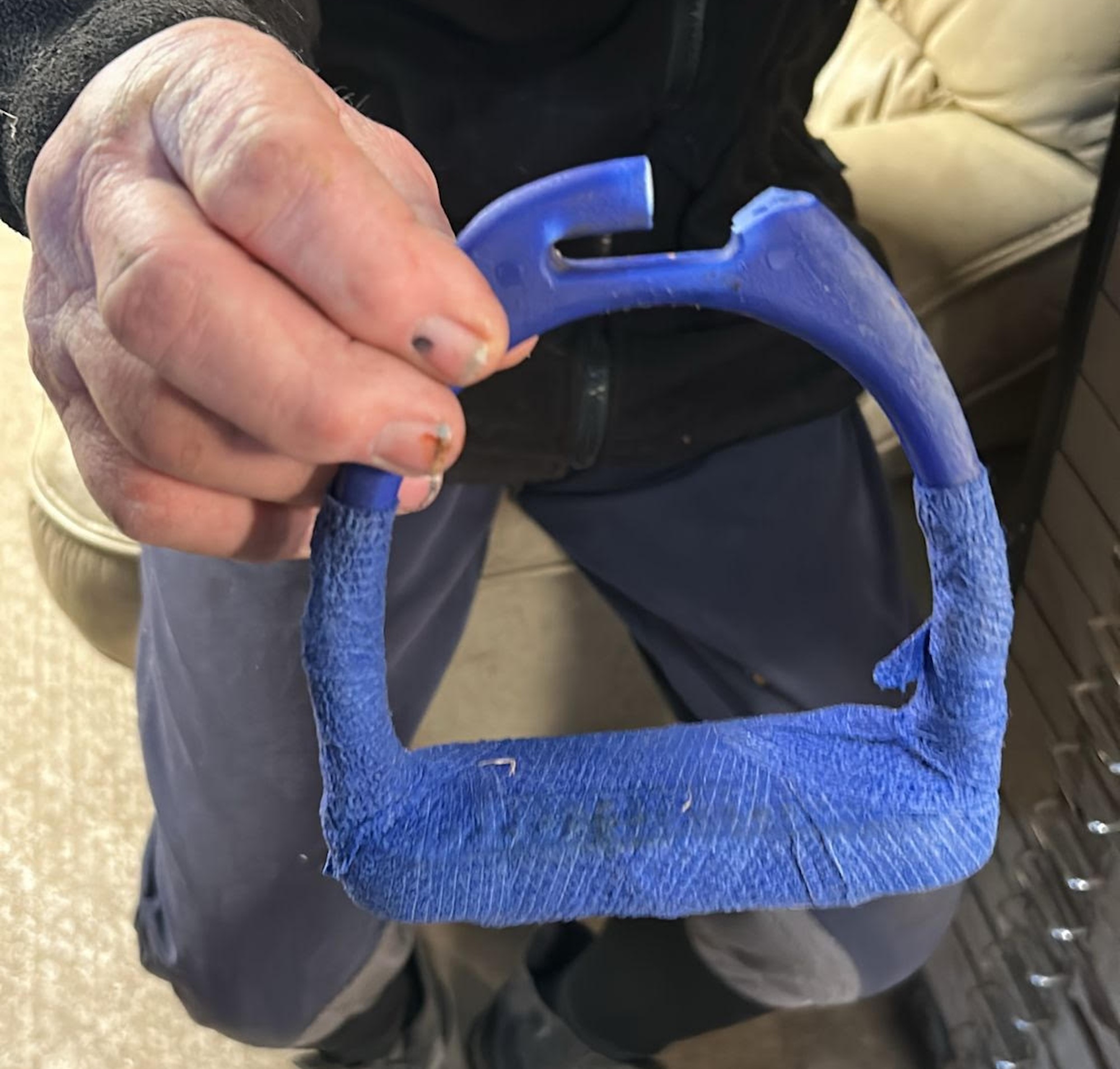 The stirrup, broken near the top