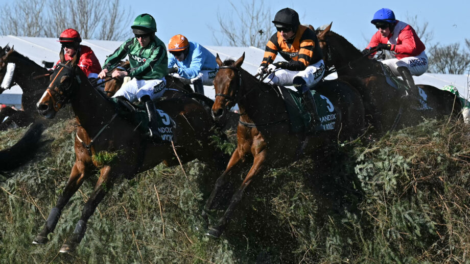 Jockey Patrick Mullins jumps The Chair on Nick Rockett on the first circuit on the way to winning the Grand National Handicap Chase on the final day of the Grand National Festival horse race meeting at Aintree Racecourse in Liverpool.