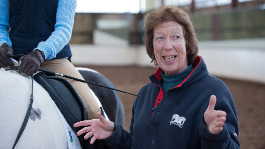 Pammy Hutton FBHS teaching a young rider