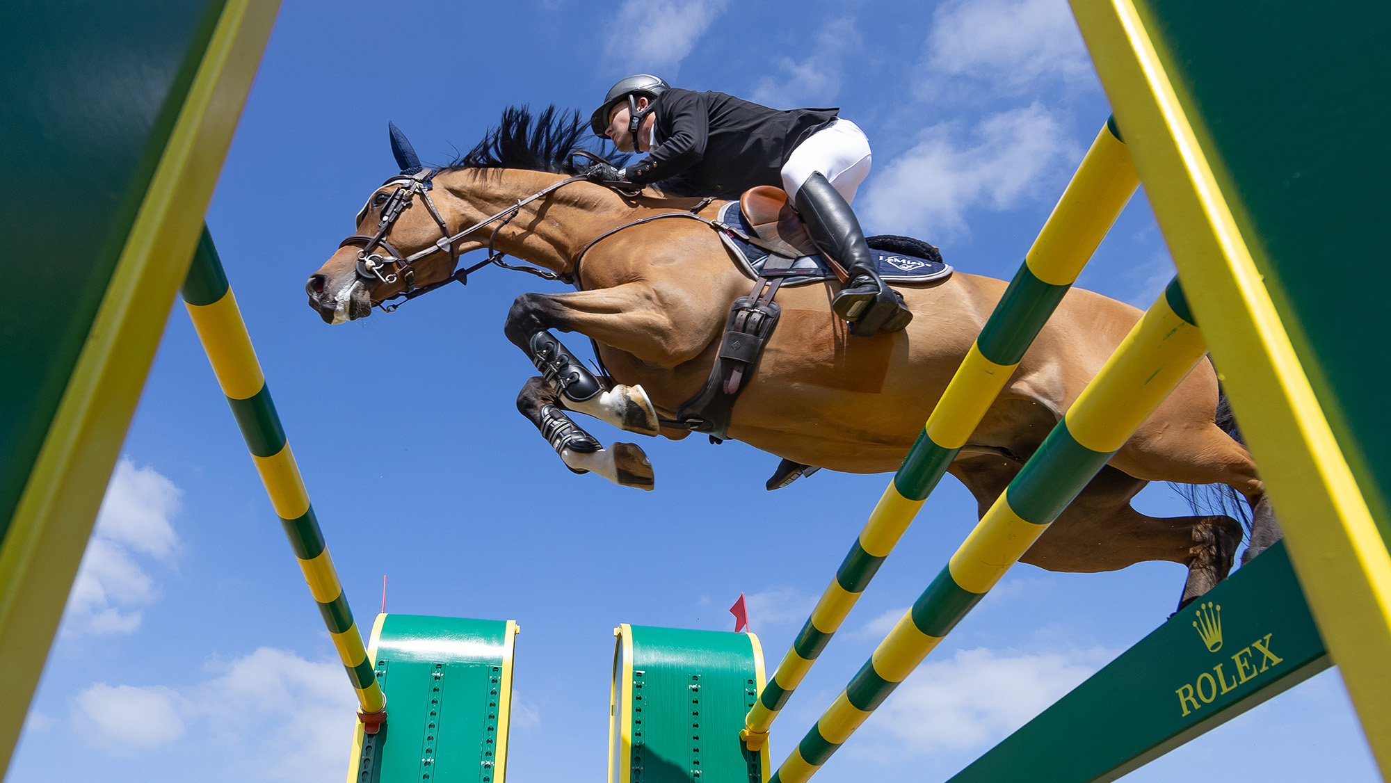 Harry Charles riding Sherlock in the Rolex Grand Prix at Royal Windsor Horse Show