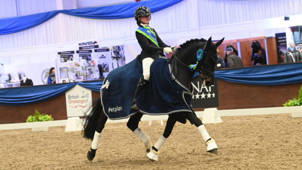 Amelia Dovey and her New Forest pony, Artists Ambassador, in the prizegiving after winning the novice silver under-21 at the Winter Area Festival Championships.