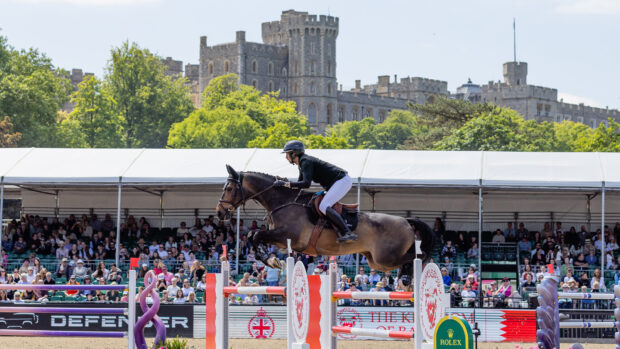 Martin Fuchs jumping Commissar Pezi in front of the castle at Royal Windsor Horse Show