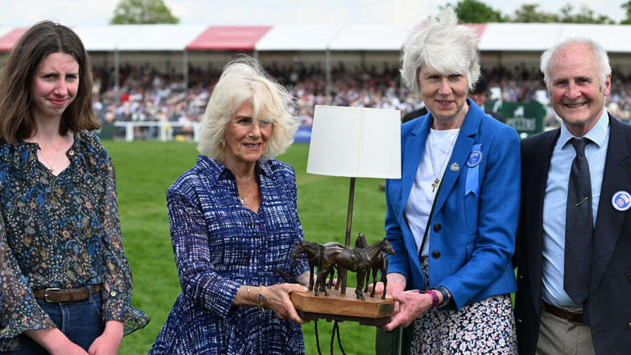 The Queen at Badminton Horse Trials in 2024, making a presentation to event director Jane Tuckwell to mark her 50 years working at the event.