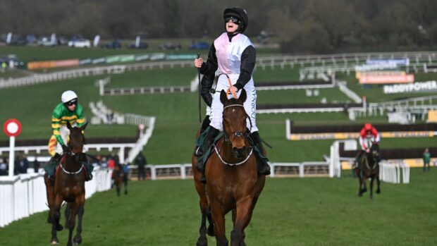 Jockey Rachael Blackmore celebrates after the victory of Bob Olinger in the Stayer's Hurdle on the third day of the Cheltenham Festival at Cheltenham Racecourse, in Cheltenham, western England on March 13, 2025. (Photo by JUSTIN TALLIS / AFP)