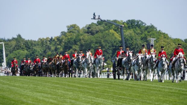 ASCOT, ENGLAND - JUNE 18: The royal procession make their way down the course on day two during Royal Ascot 2025 at Ascot Racecourse on June 18, 2025 in Ascot, England. (Photo by Alan Crowhurst/Getty Images for Ascot Racecourse)