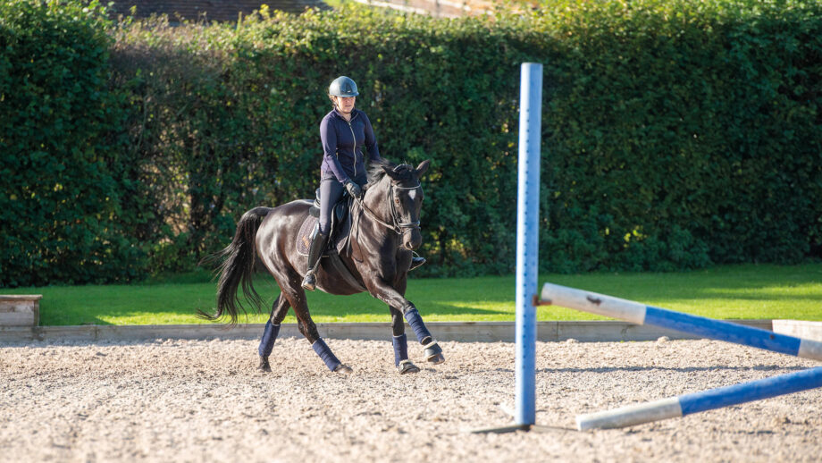 Rider approaching first fence of figure of eight jumping exercise