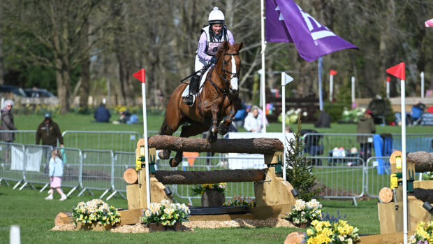 Gemma Stevens and Chilli King jump a cross-country fence at Thoresby 2025.