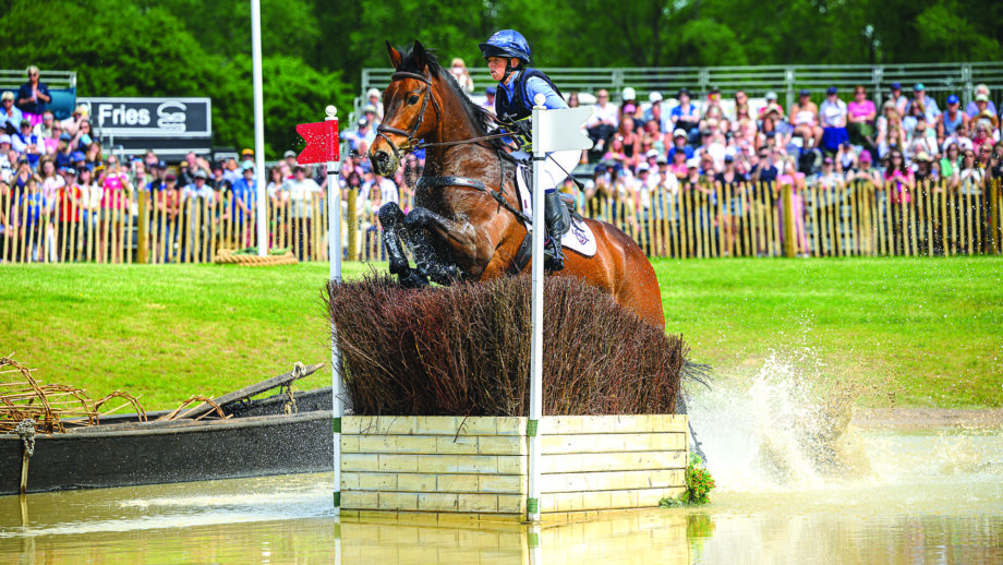 Ros Canter and Lordships Graffalo jump a cross-country fence in The Lake at Badminton 2025.