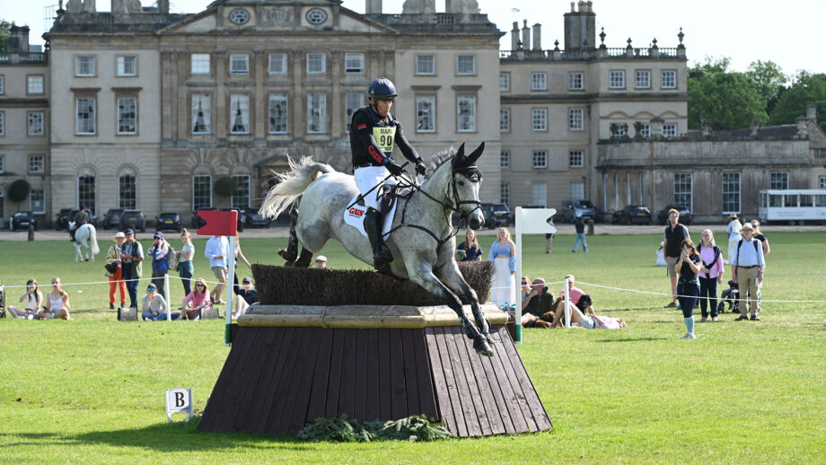 Oliver Townend and Cooley Rosalent jump a cross-country fence in front of the house at Badminton Horse Trials 2025.