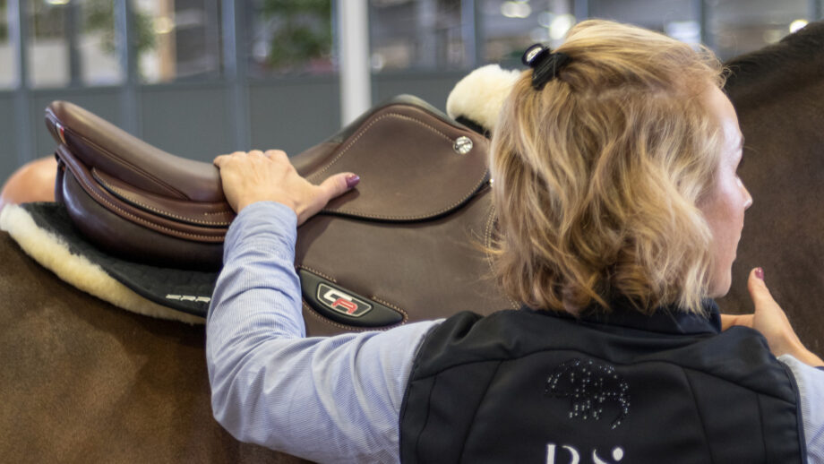 Ruth Spencer demonstrating a saddle fitting