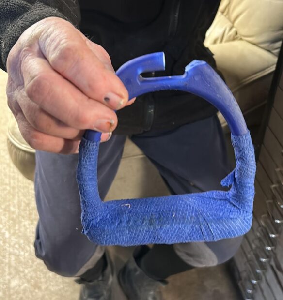 A plastic stirrup that broke during a race at a point-to-point