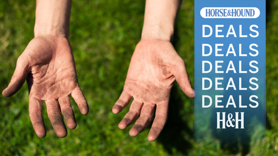 Dirty hands held over grass with H&H deals graphic