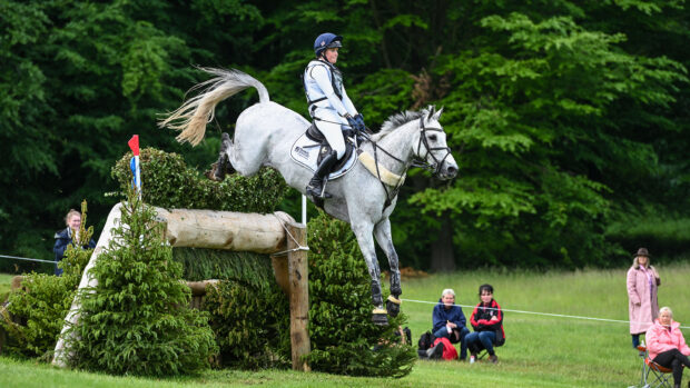 Bubby Upton and Its Cooley Time jump a cross-country fence at Bramham 2025.