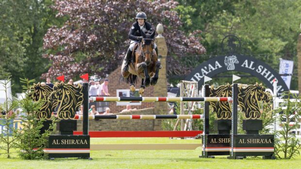 Sean Monaghan and Toyger jump an Al Shira'aa fence at Hickstead
