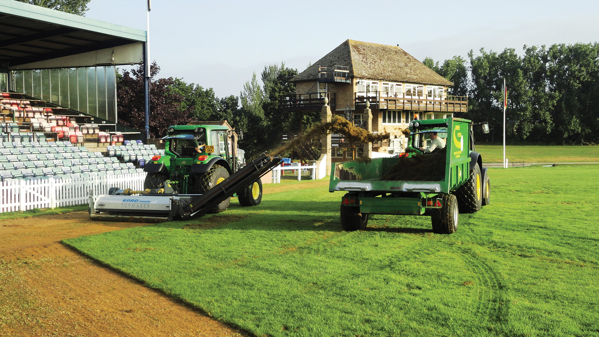 Tractor mowing grass at Hickstead