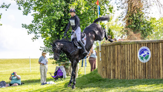 Caroline Pamukcu and HSH Blake seal their selection for the US squad at the 2026 eventing World Championships with second in the five-star at Kentucky – they are pictured dropping down a big step on the cross-country.