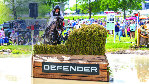 US World Championship team members Will Coleman and Diabolo jump a fence in water at Kentucky 2025.