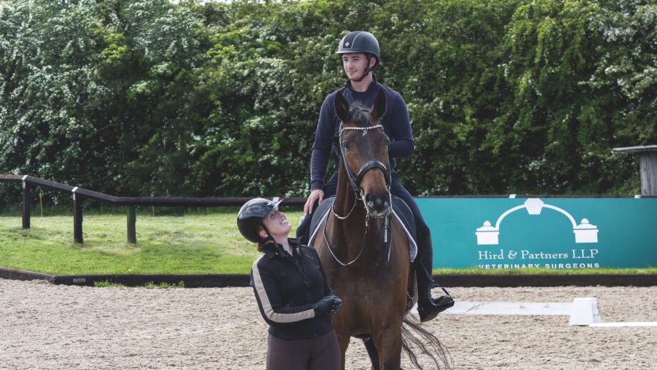 Jack Whitaker riding Jagerbomb, with Becky Moody standing