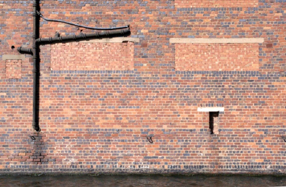 the factory wall as it says on the tin