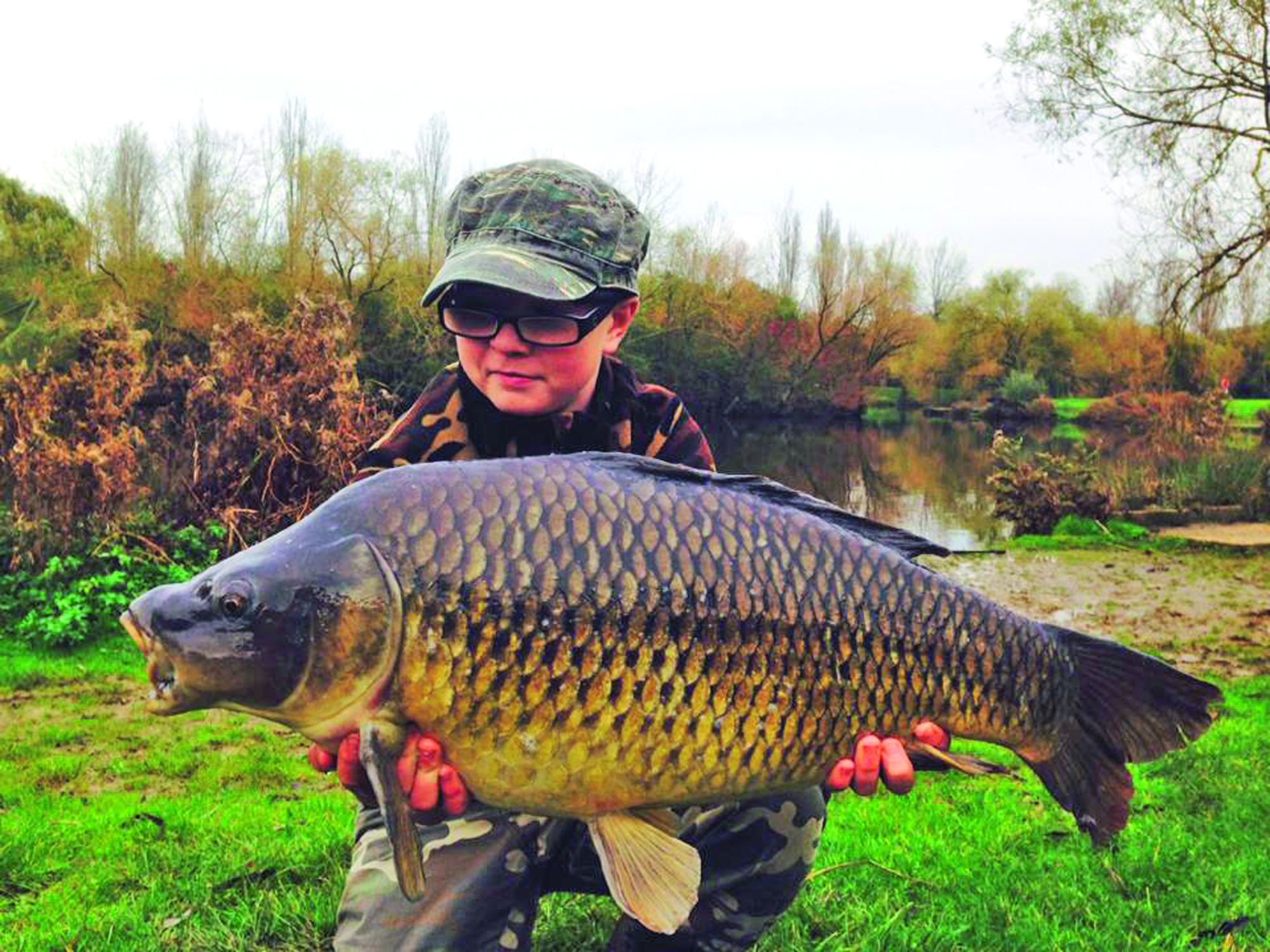 Local 14-year-old Lewis Mulberry was chuffed with this 20 lb 9 oz common carp caught at Gloucester Park on a Mainline Cell boilie.